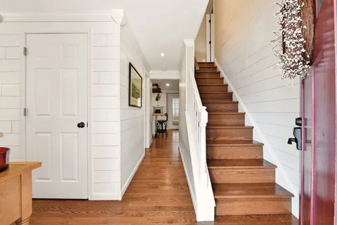 a view of staircase with white walls