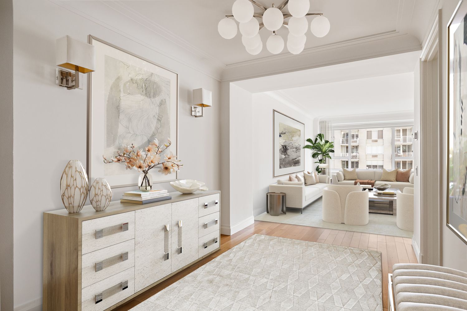 a living room with kitchen island furniture and a chandelier