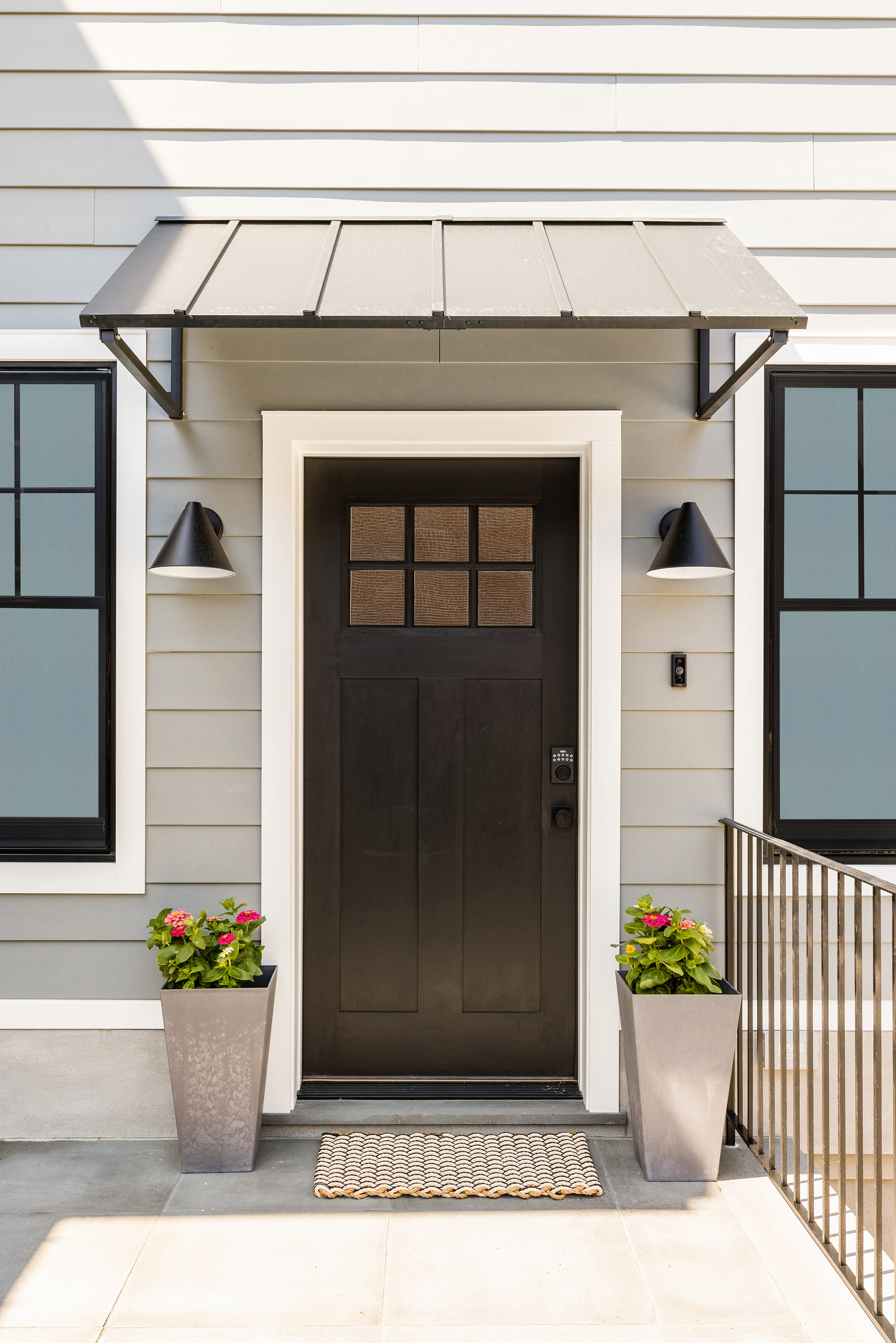578 20th Street Brooklyn, NY 11218 - Photo 26 of 28 a view of a white house with potted plants
