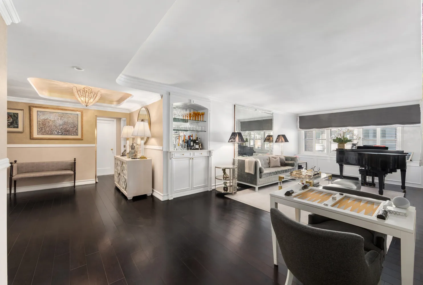 a work room with furniture and wooden floor