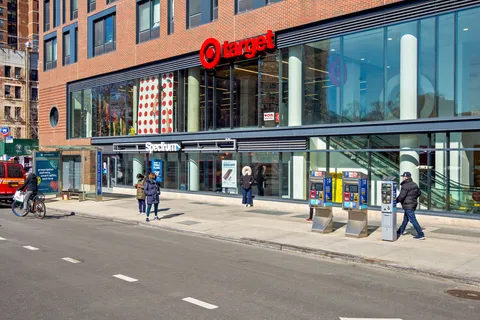 a view of a building with sitting area