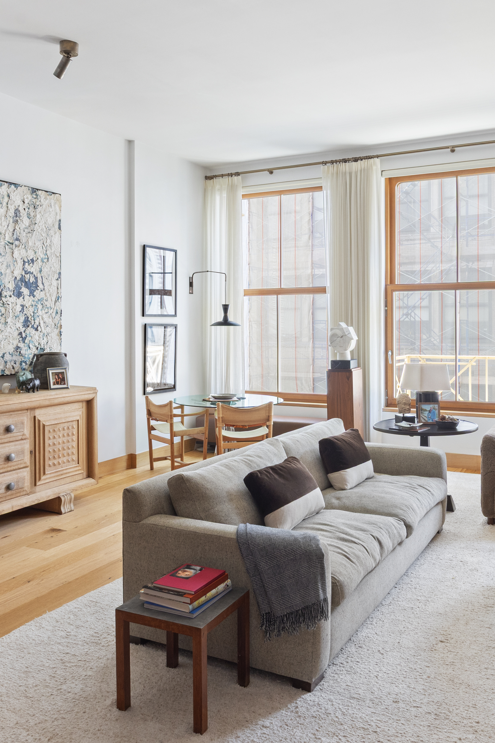 60 White Street, Unit 4E Manhattan, NY 10013 - Photo 6 of 19 a living room with furniture and a large window