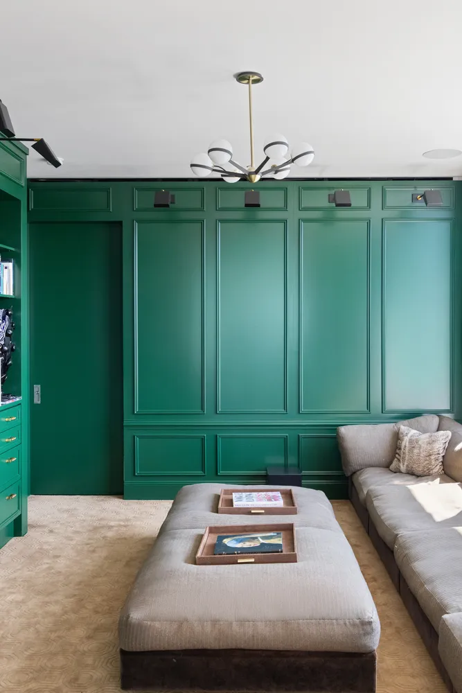 a view of hallway with window and stairs