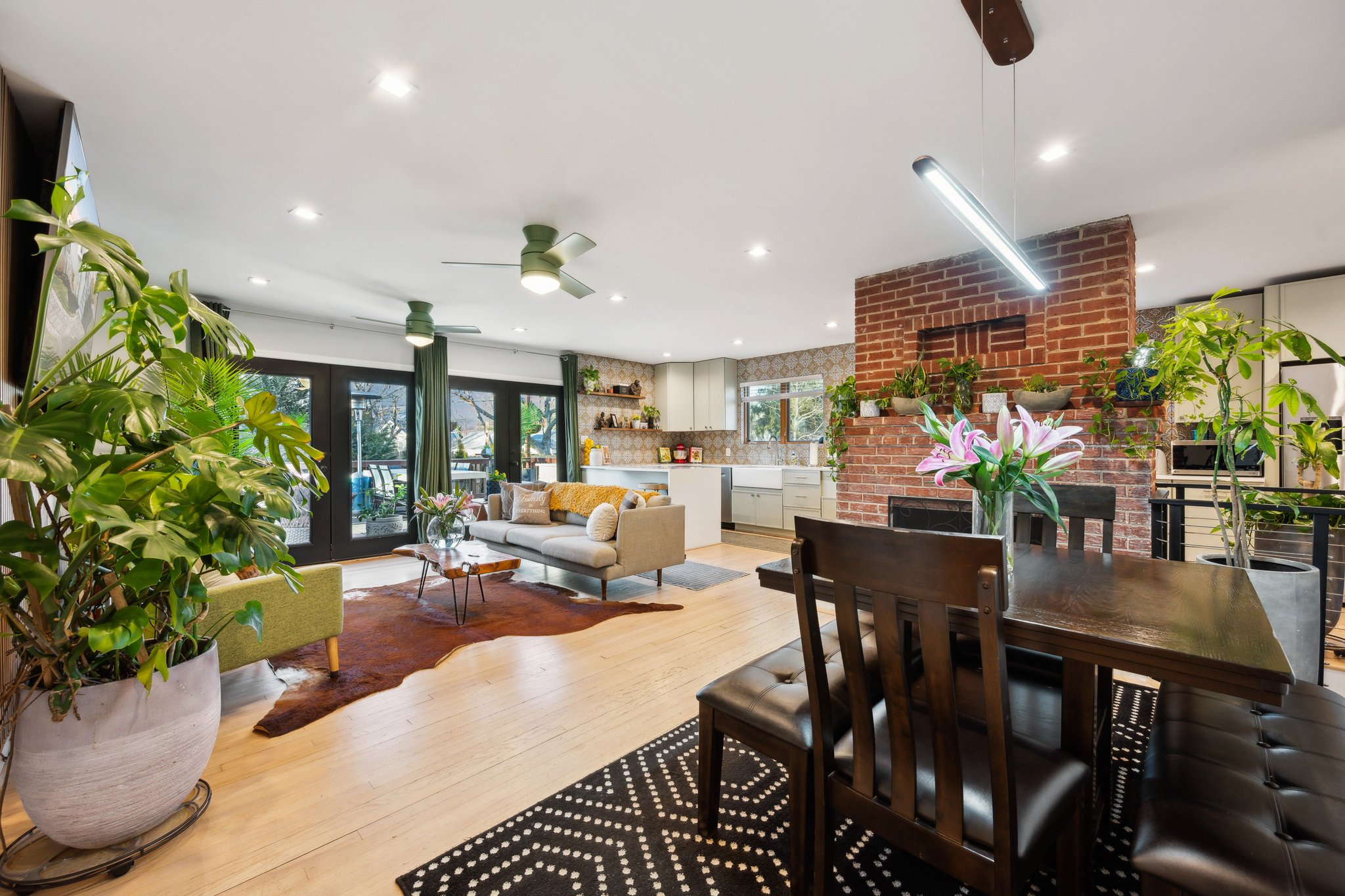 2607 Ross Road Chevy Chase, MD 20815 - Photo 10 of 37 a living room with furniture kitchen view and a potted plant