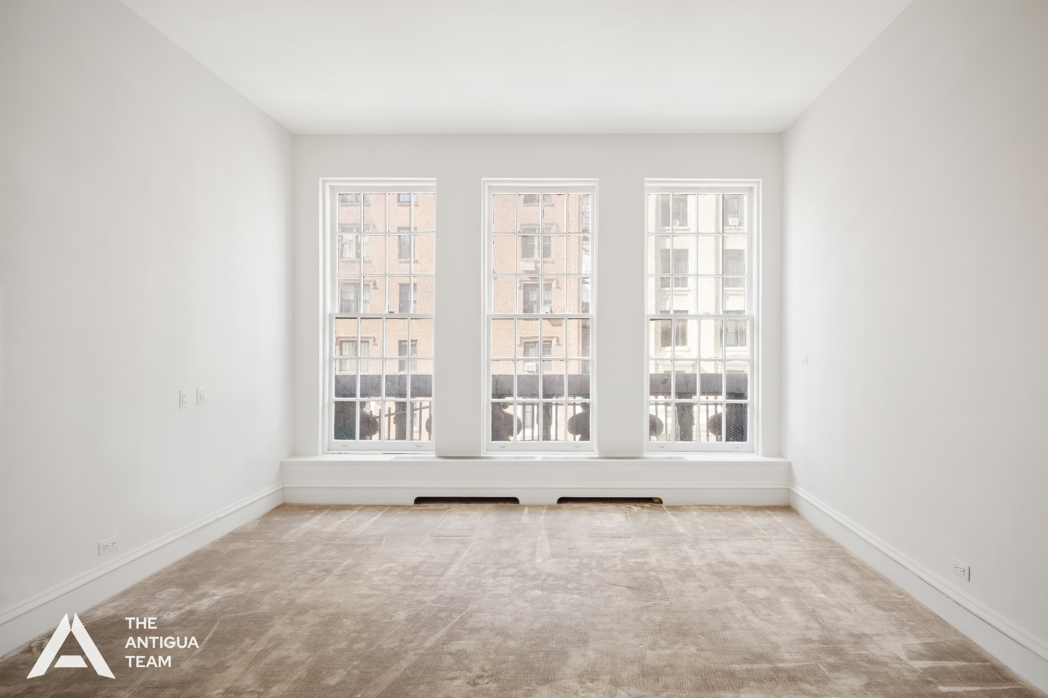 45 East 66th Street, Unit 4W Manhattan, NY 10065 - Photo 17 of 27 an empty room with a window
