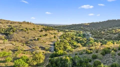 a view of city and swimming pool