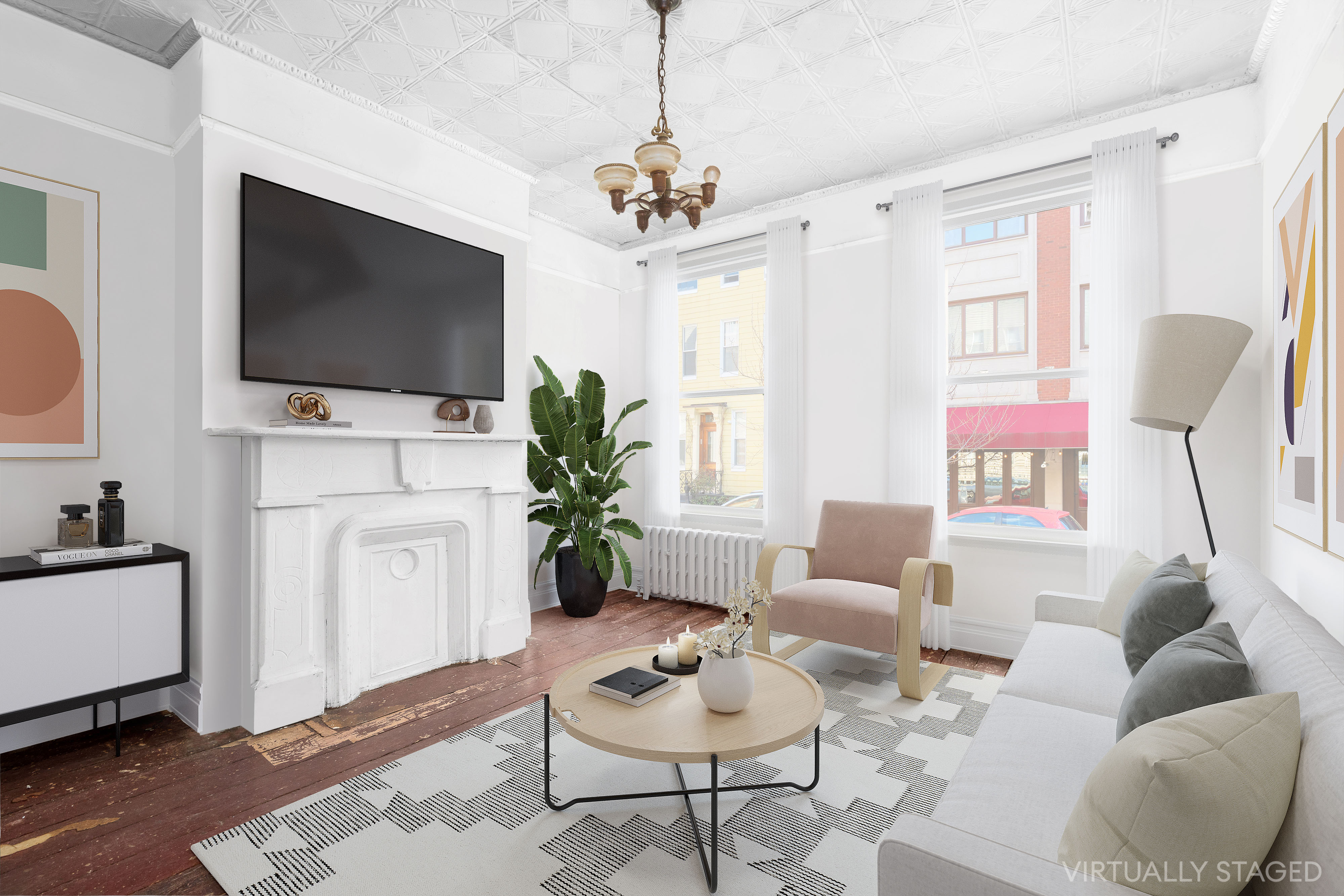 147 Eckford Street Brooklyn, NY 11222 - Photo 2 of 9 a living room with furniture a flat screen tv and a chandelier