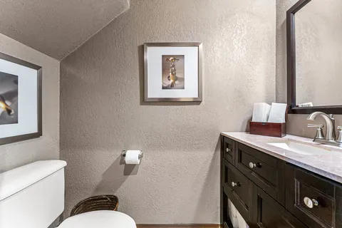 a view of a dining room with furniture and window