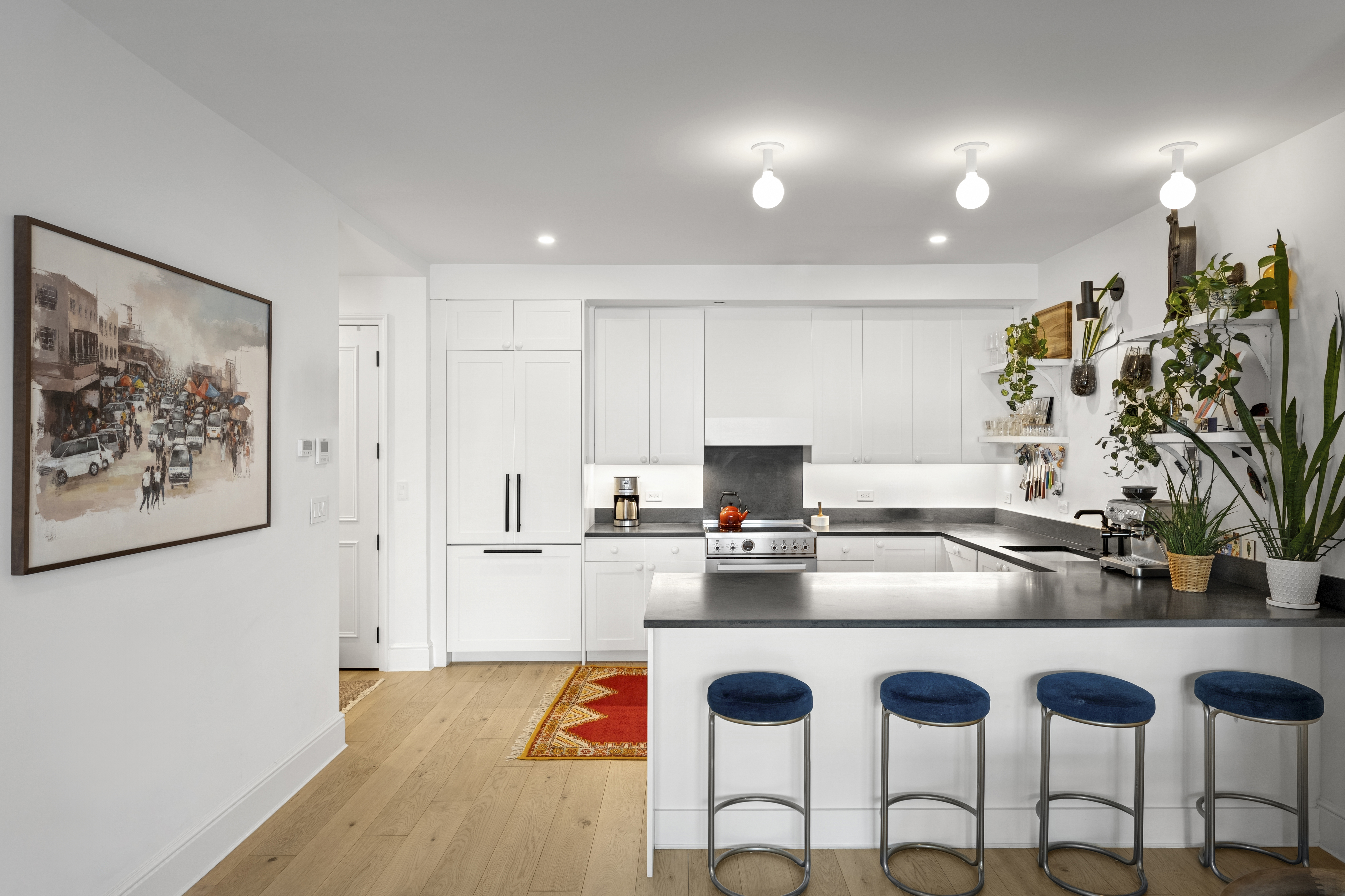 488 Sterling Place, Unit 4A Brooklyn, NY 11238 - Photo 4 of 13 a kitchen with granite countertop a refrigerator and a stove
