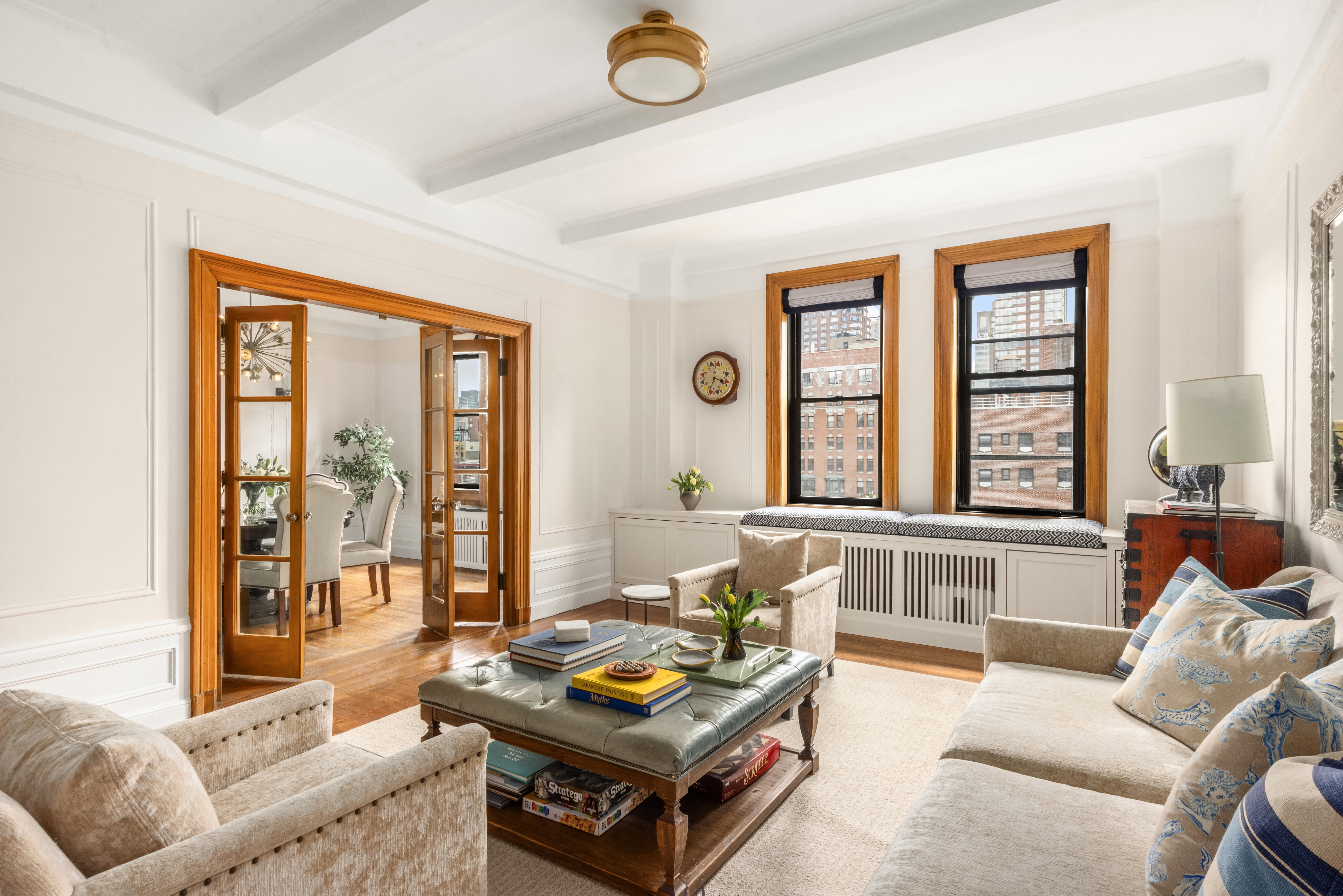 119 West 71st Street, Unit 9B Manhattan, NY 10023 - Photo 3 of 18 a living room with furniture and a large window