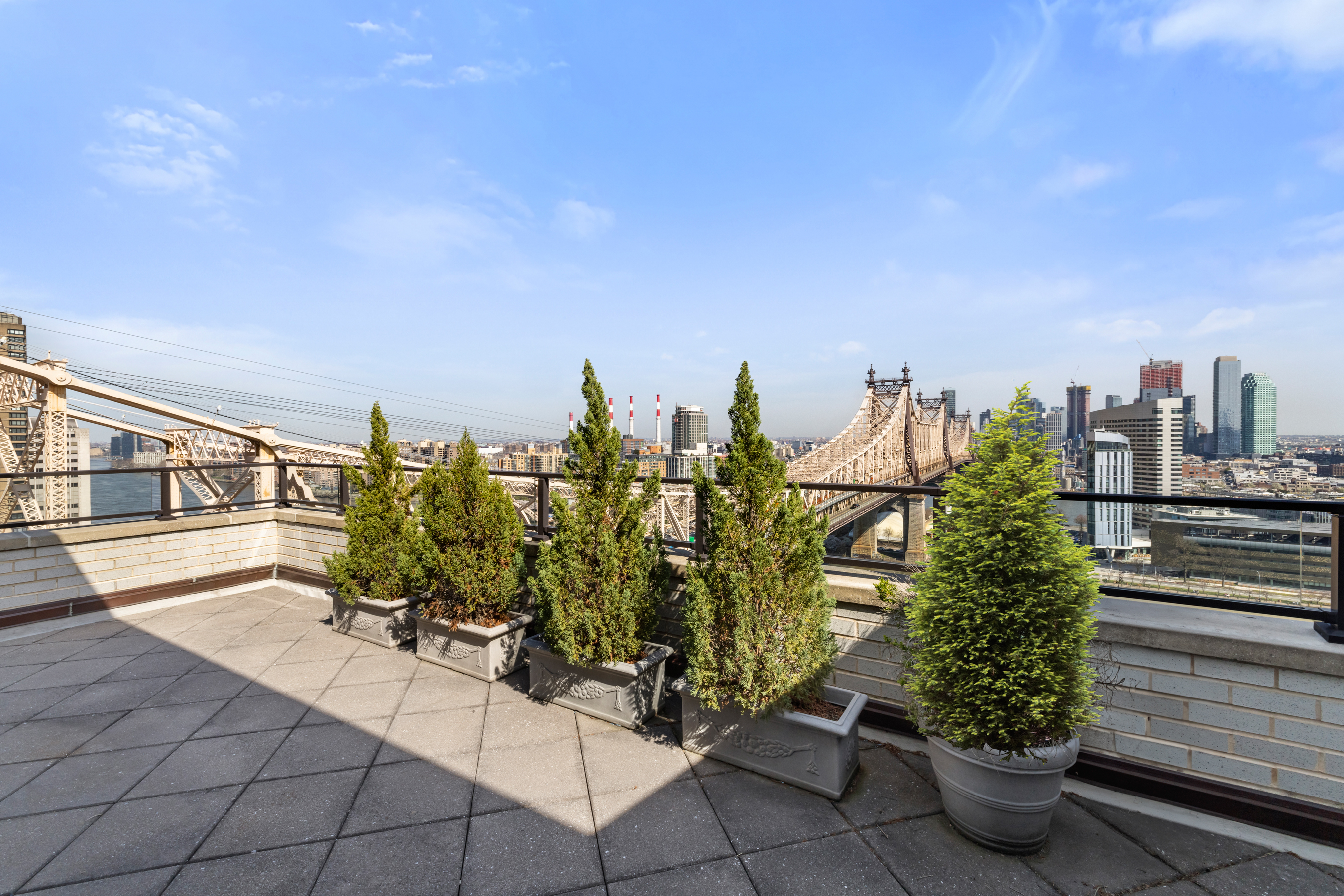 35 Sutton Place, Unit PHB Manhattan, NY 10022 - Photo 2 of 14 a view of a terrace with sitting space
