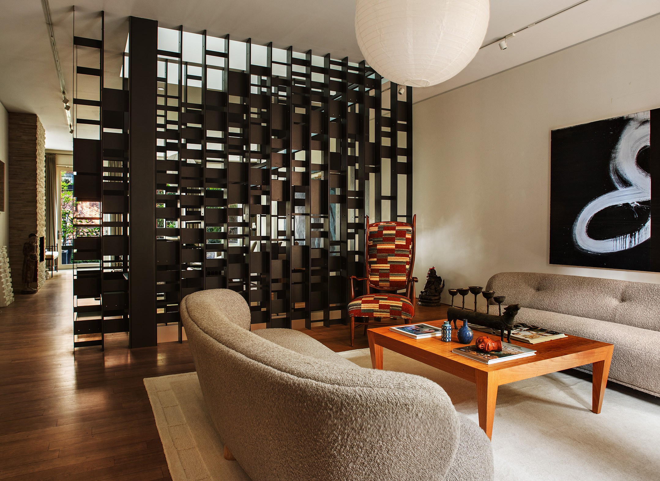 12 Sidney Place Brooklyn, NY 11201 - Photo 8 of 36 a living room with furniture a lamp and rug