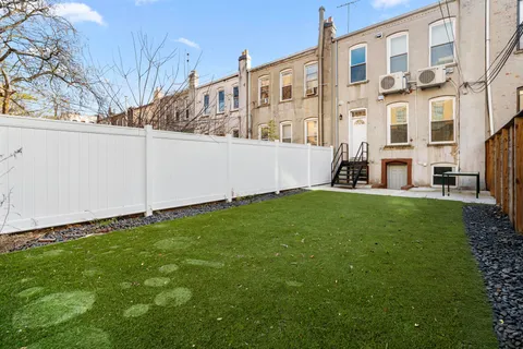 a view of building with yard