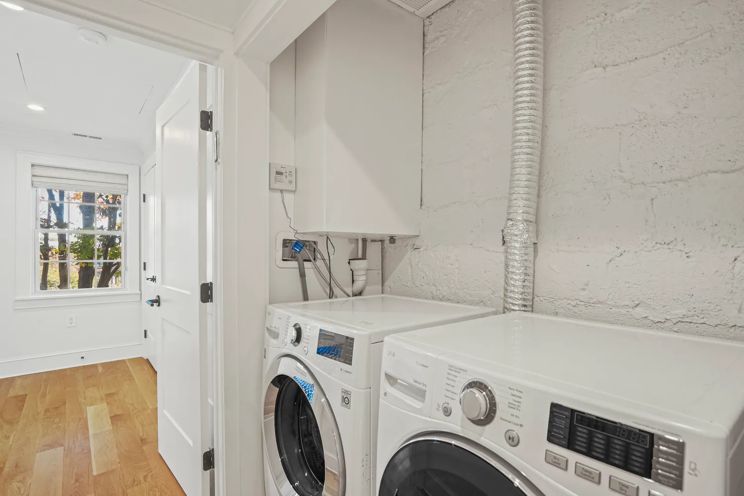 a view of a wooden chairs on the deck