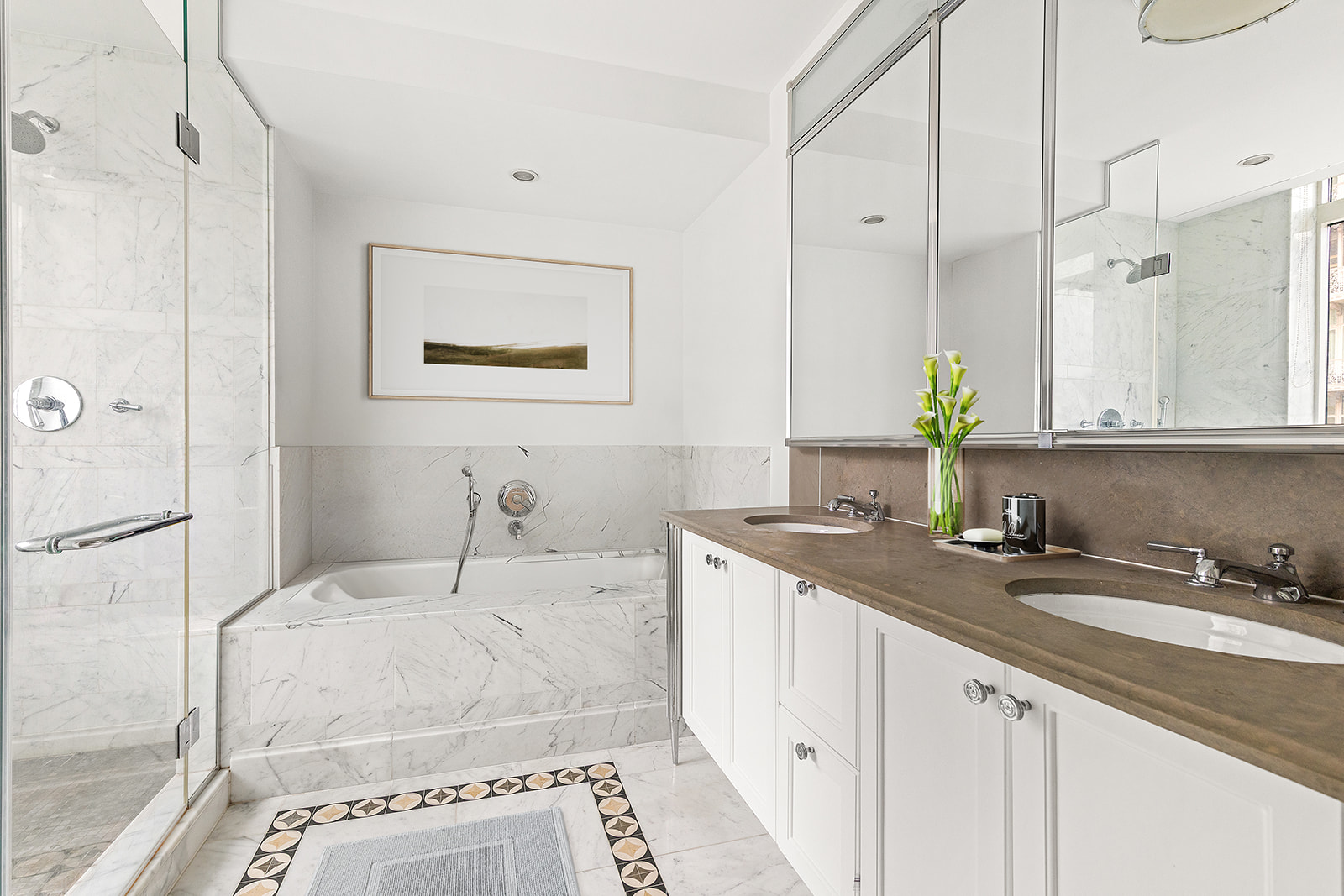 205 West 76th Street, Unit PH1F Manhattan, NY 10023 - Photo 7 of 18 a bathroom with a sink and a mirror