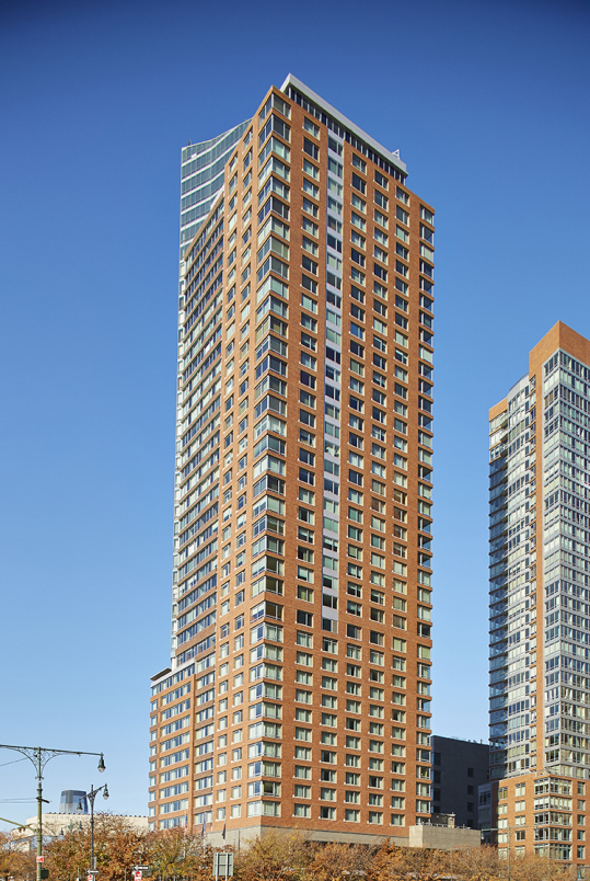 10 West Street, Unit 28C Manhattan, NY 10004 - Photo 11 of 12 a front view of a building