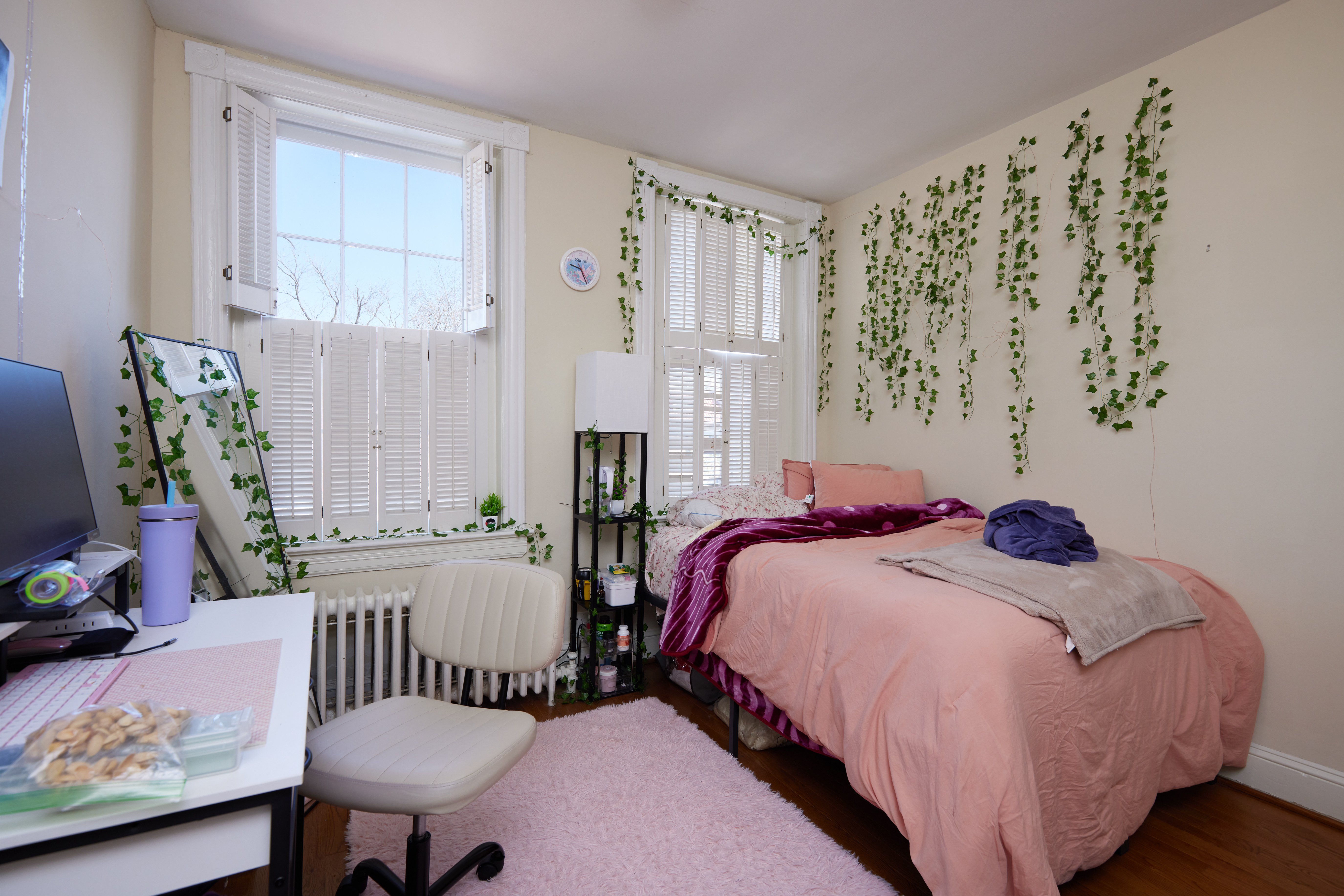 3420 R Street Northwest Washington, DC 20007 - Photo 31 of 53 a bedroom with a bed and a chandelier