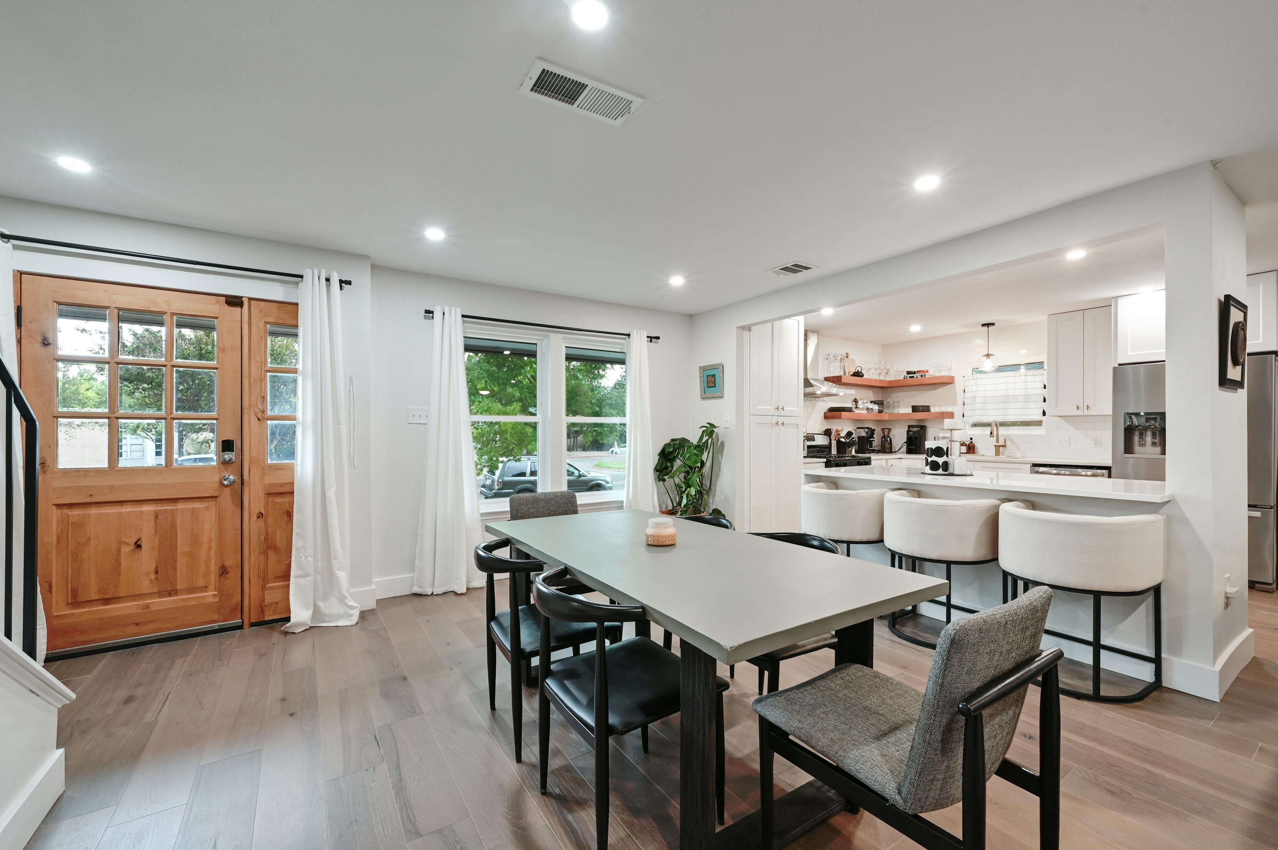 Address Upon Request Austin, TX 78745 - Photo 4 of 19 a view of a dining room with furniture window and wooden floor