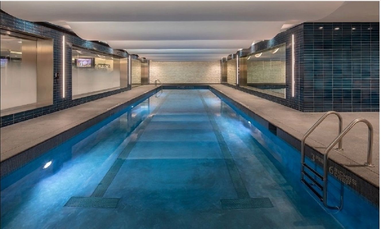 70 Charlton Street, Unit 7E Manhattan, NY 10014 - Photo 11 of 17 a view of a hallway with wooden floor
