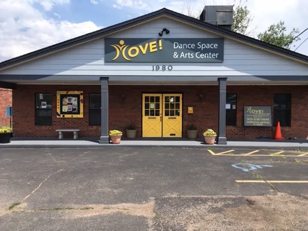 a view of a brick building with a large window