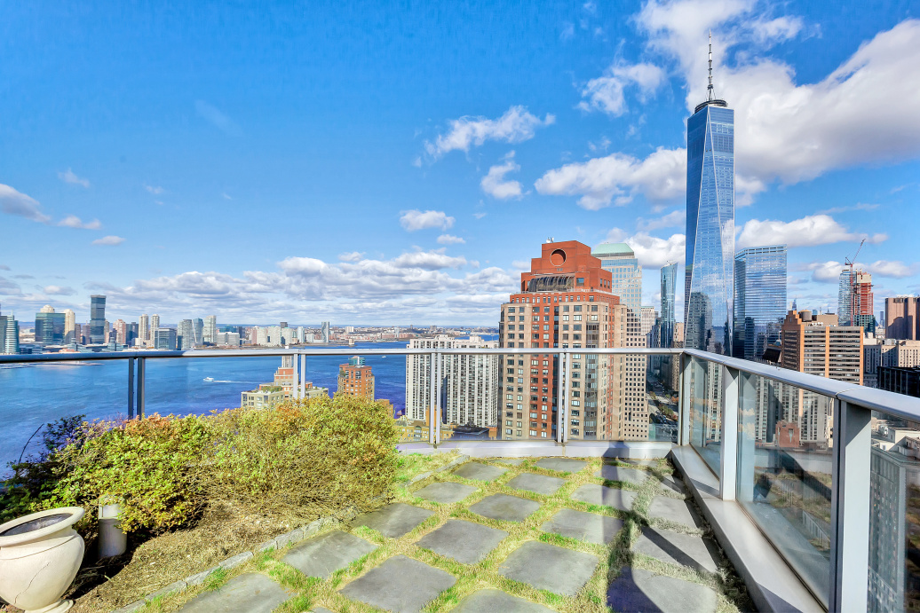 70 Little West Street, Unit PH2A Manhattan, NY 10004 - Photo 2 of 2 a view of a balcony with city view