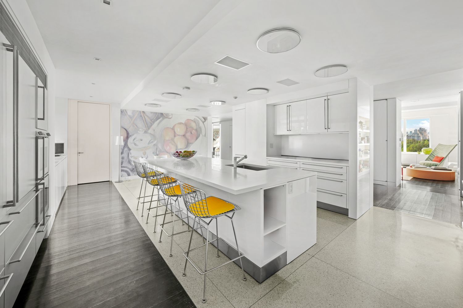 a kitchen with stainless steel appliances granite countertop a sink and cabinets