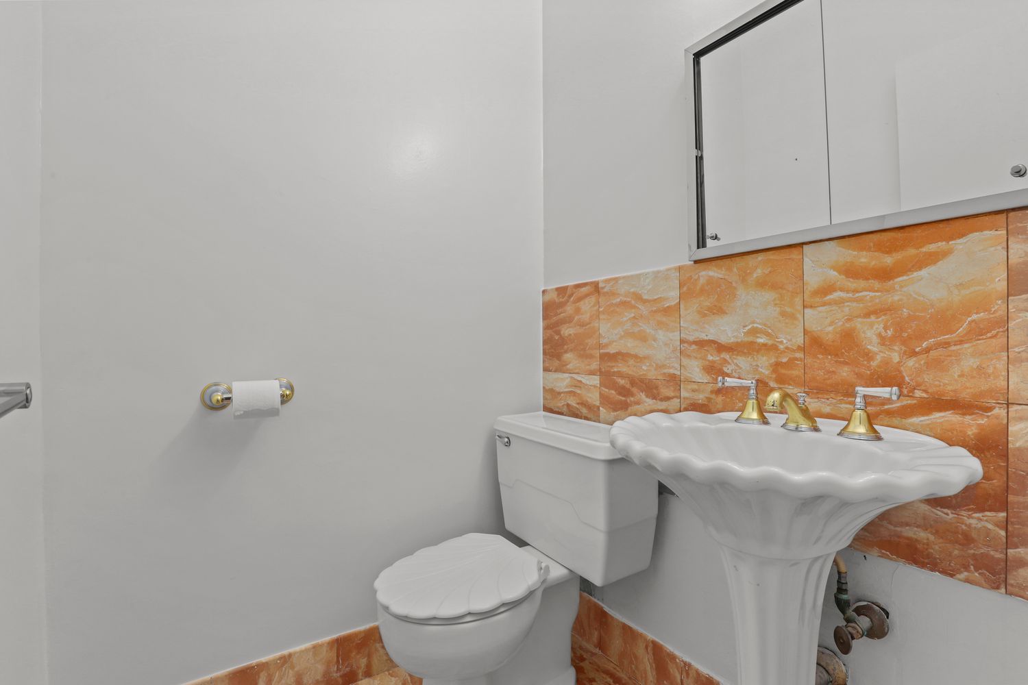 4455 Douglas Avenue, Unit 3F Bronx, NY 10471 - Photo 6 of 27 a bathroom with a sink toilet and mirror