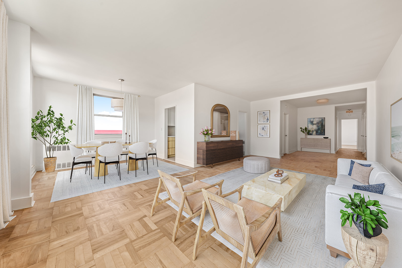110-50 71st Road, Unit PHD Queens, NY 11375 - Photo 2 of 14 a living room with furniture a dining table and a potted plant