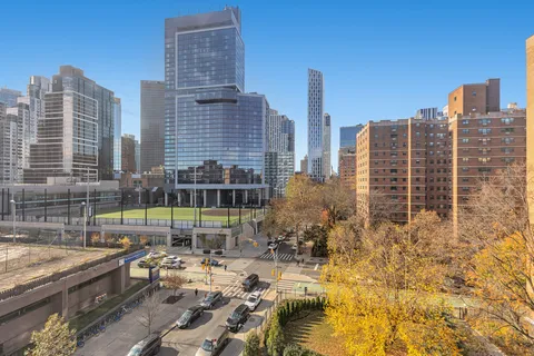 a view of city with tall buildings