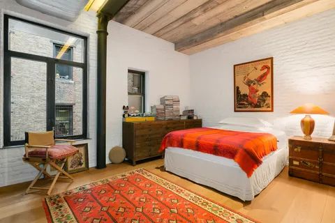 a bathroom with a bathtub and a sink