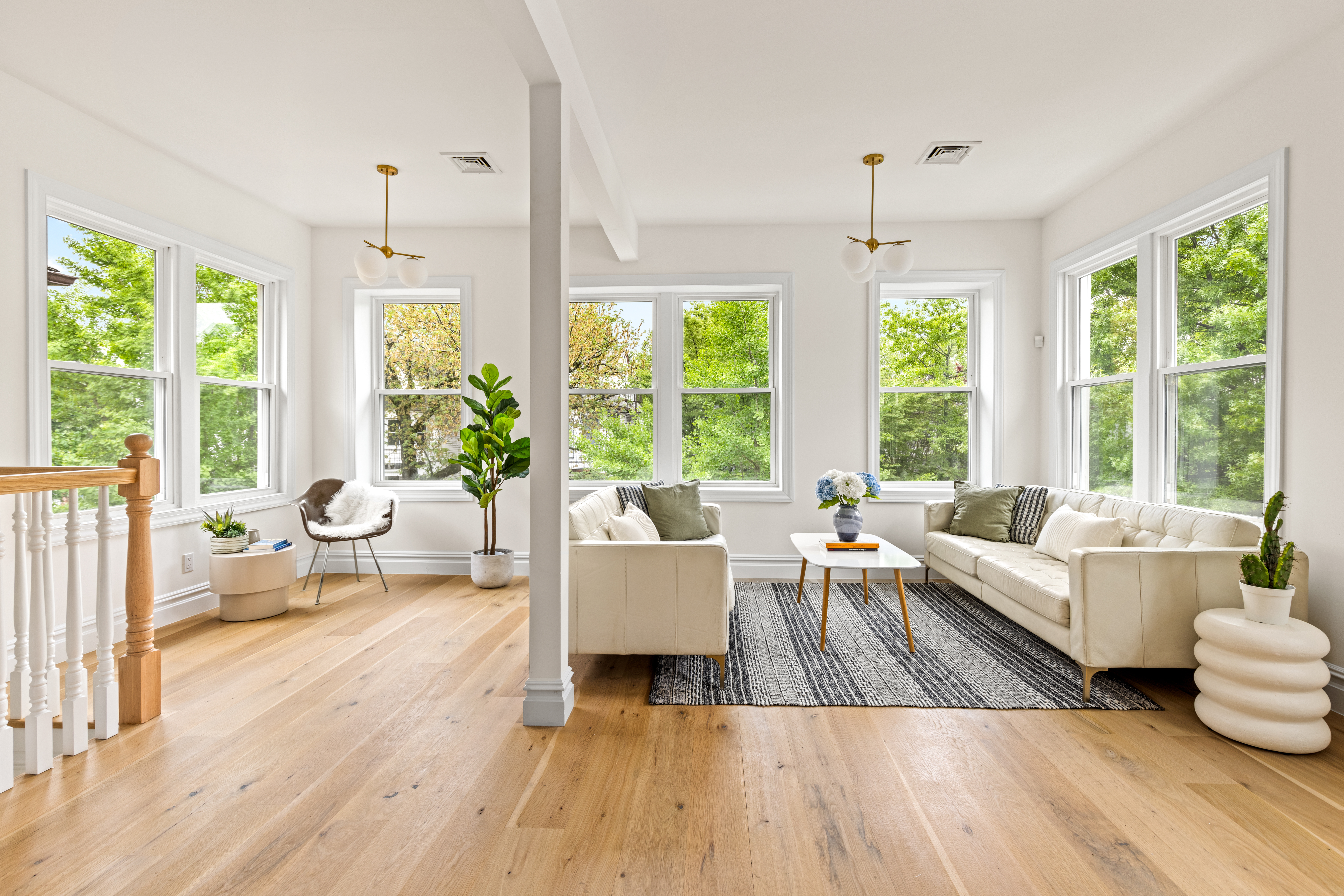 409 East 4th Street Brooklyn, NY 11218 - Photo 1 of 19 a living room with furniture and a large window