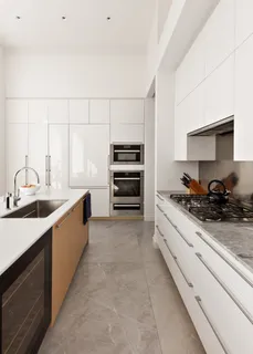 a kitchen with a sink stove and cabinets