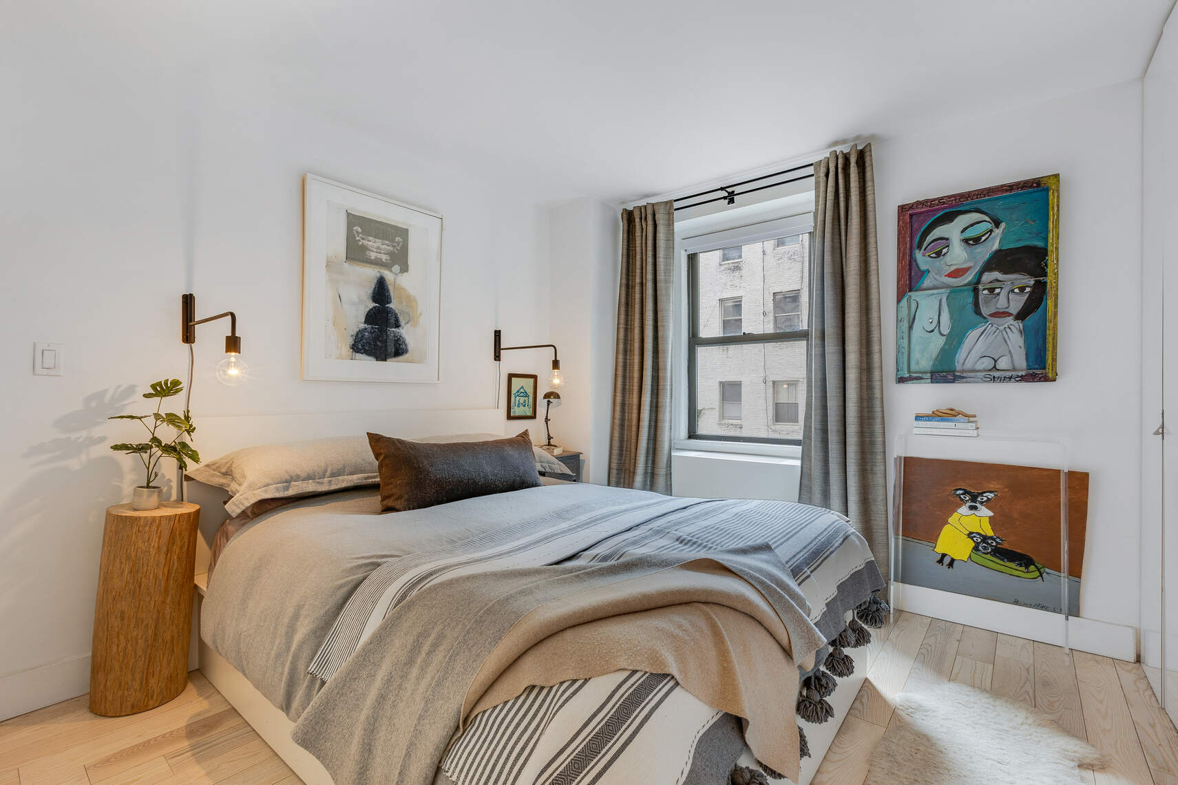 201 East 21st Street, Unit 4M Manhattan, NY 10010 - Photo 7 of 11 a bedroom with a bed and cupboard