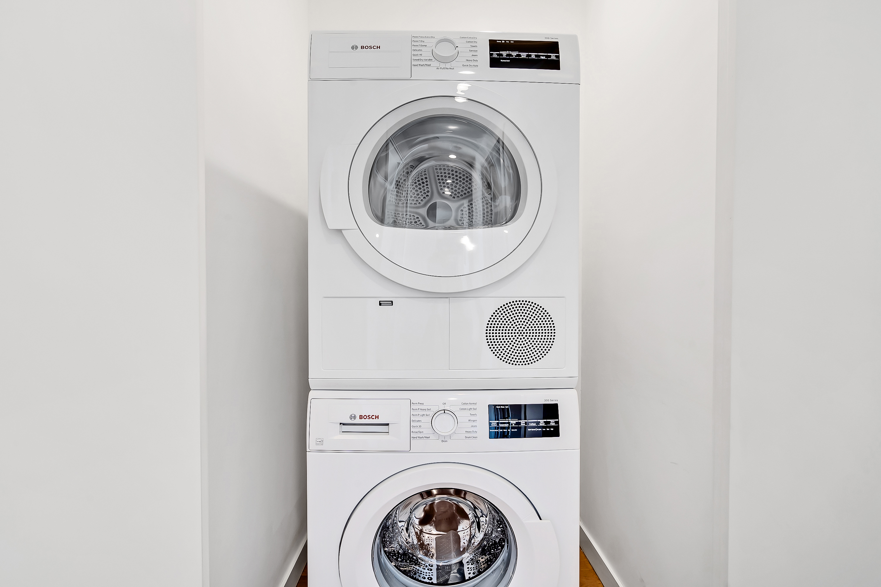 26-20 14th Place, Unit 3C Queens, NY 11102 - Photo 9 of 13 a utility room with dryer and washer