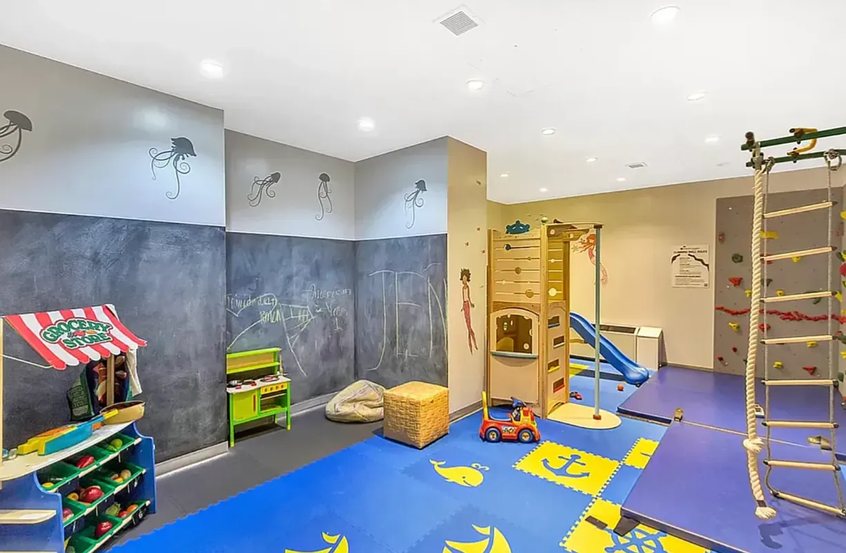 99 John Street, Unit 208 Manhattan, NY 10038 - Photo 17 of 18 a bedroom with furniture and a gym equipment