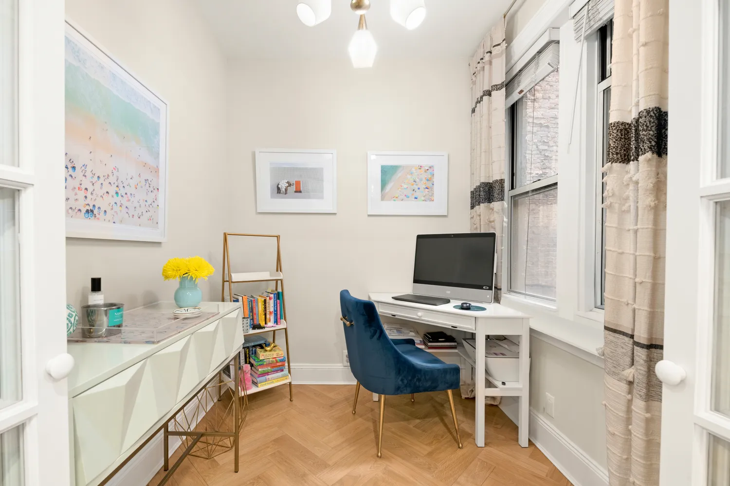 a workspace with furniture and a window