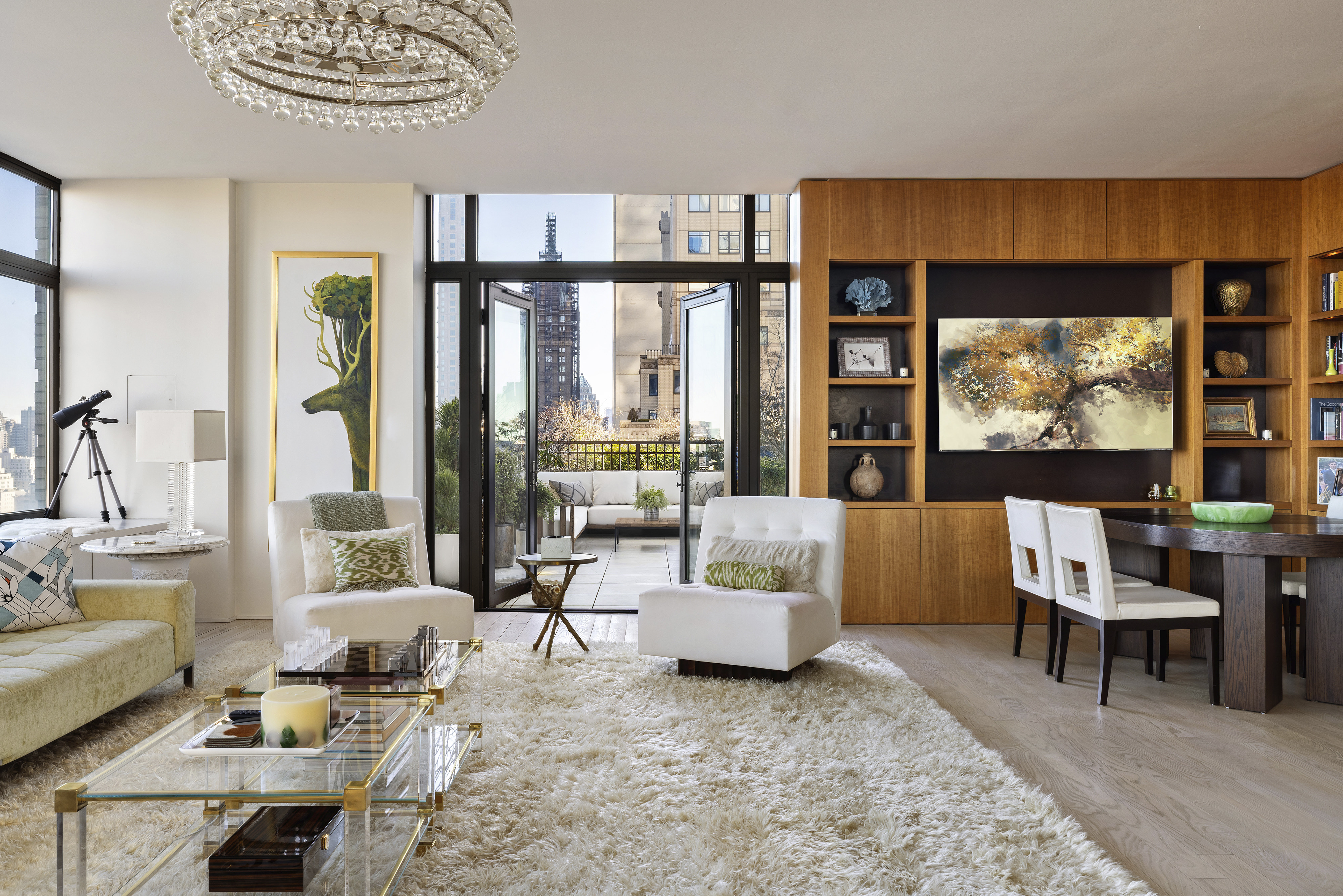 110 Central Park South, Unit PH1 Manhattan, NY 10019 - Photo 3 of 26 a living room with furniture and a flat screen tv