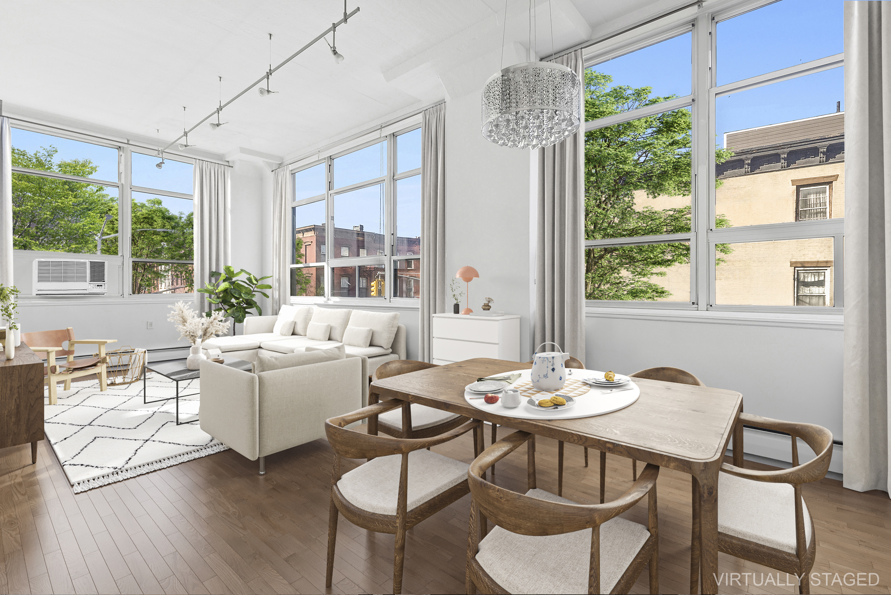 a view of a dining room with furniture window and outside view