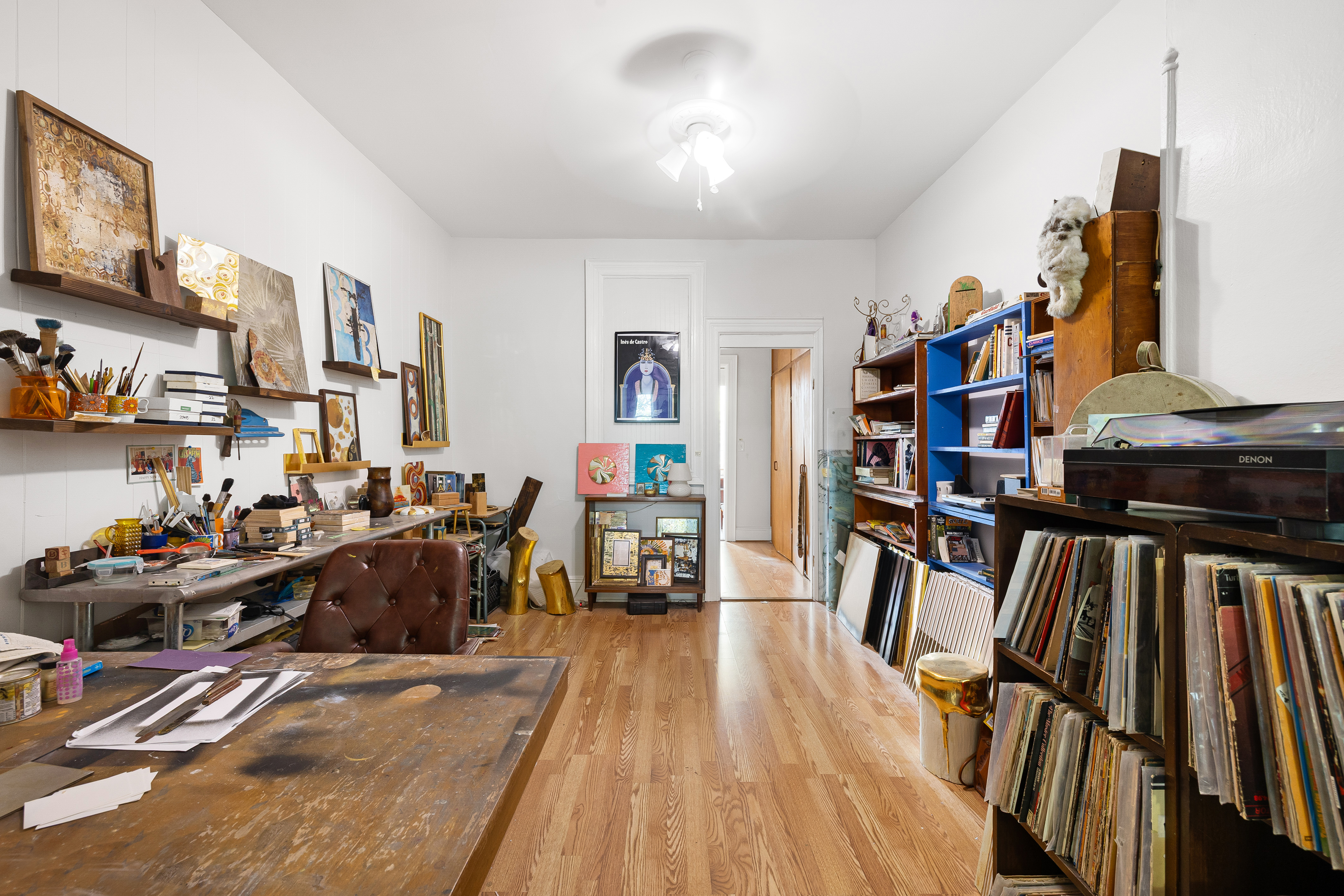 59-47 Madison Street, Unit 2 Queens, NY 11385 - Photo 5 of 12 a view of a workspace with furniture and toys