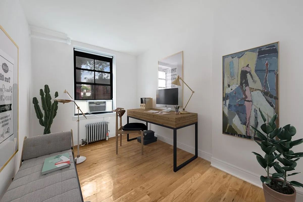 138 Baltic Street, Unit 3C Brooklyn, NY 11201 - Photo 6 of 10 a view of a livingroom with furniture and a potted plant