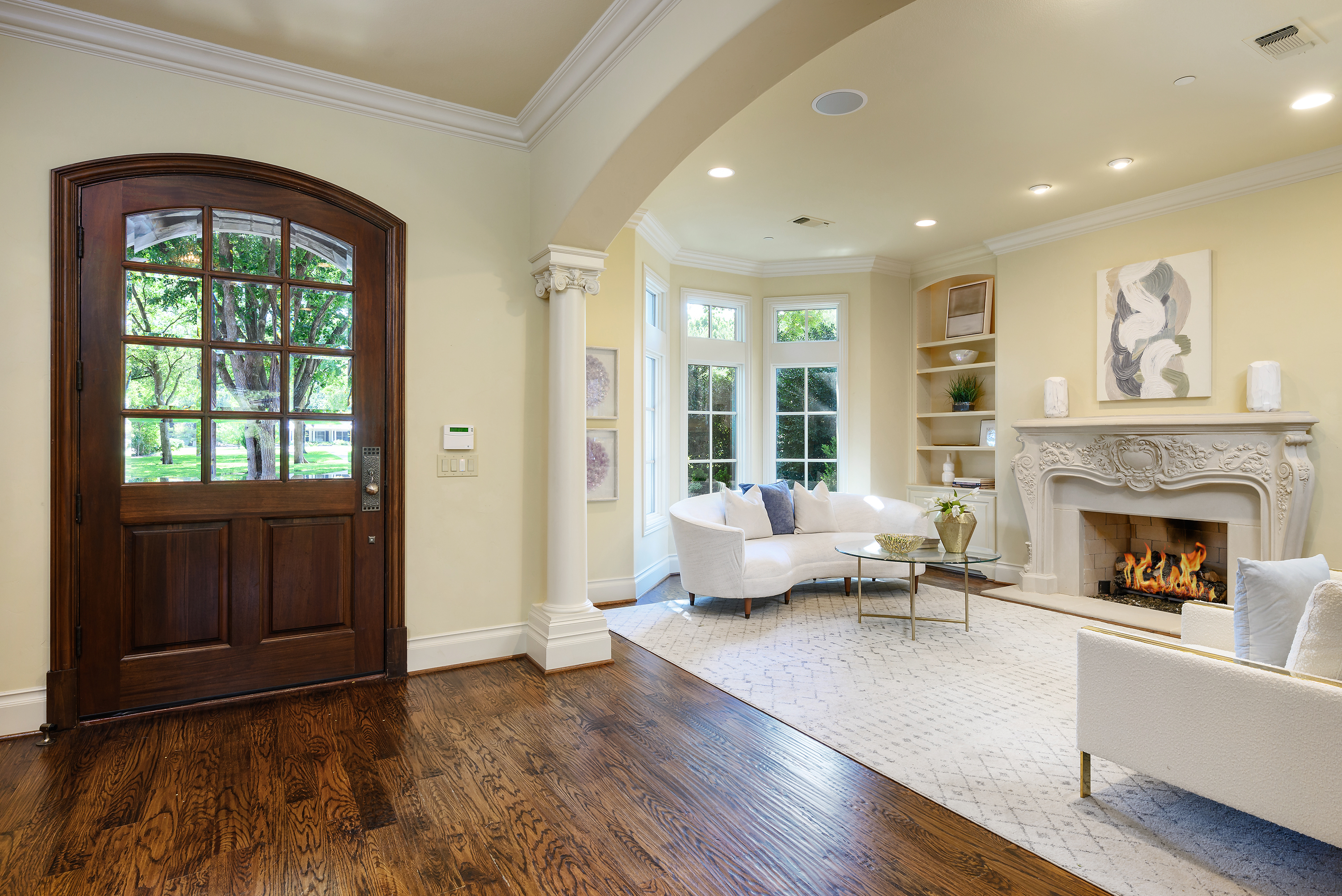 11503 West Ricks Circle Dallas, TX 75230 - Photo 4 of 39 a living room with furniture and a fireplace