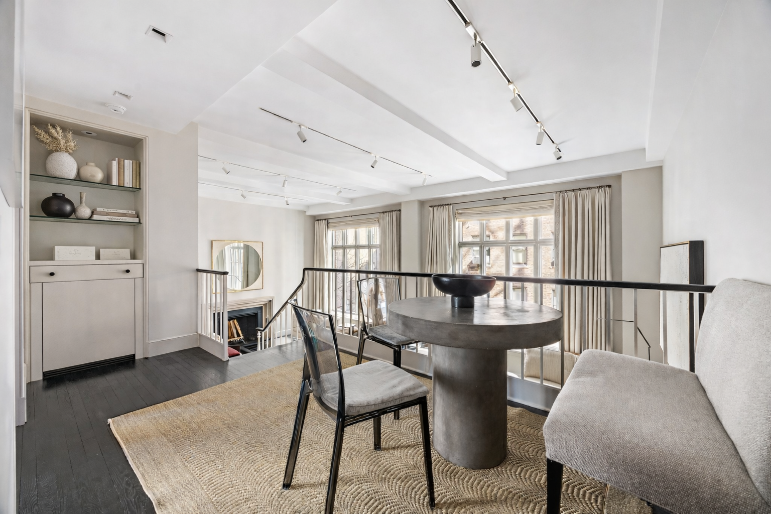 169 East 78th Street, Unit 7C Manhattan, NY 10075 - Photo 14 of 30 a view of a dining room with furniture and a window