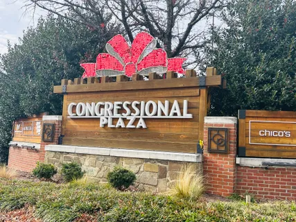 a front view of a building with large windows