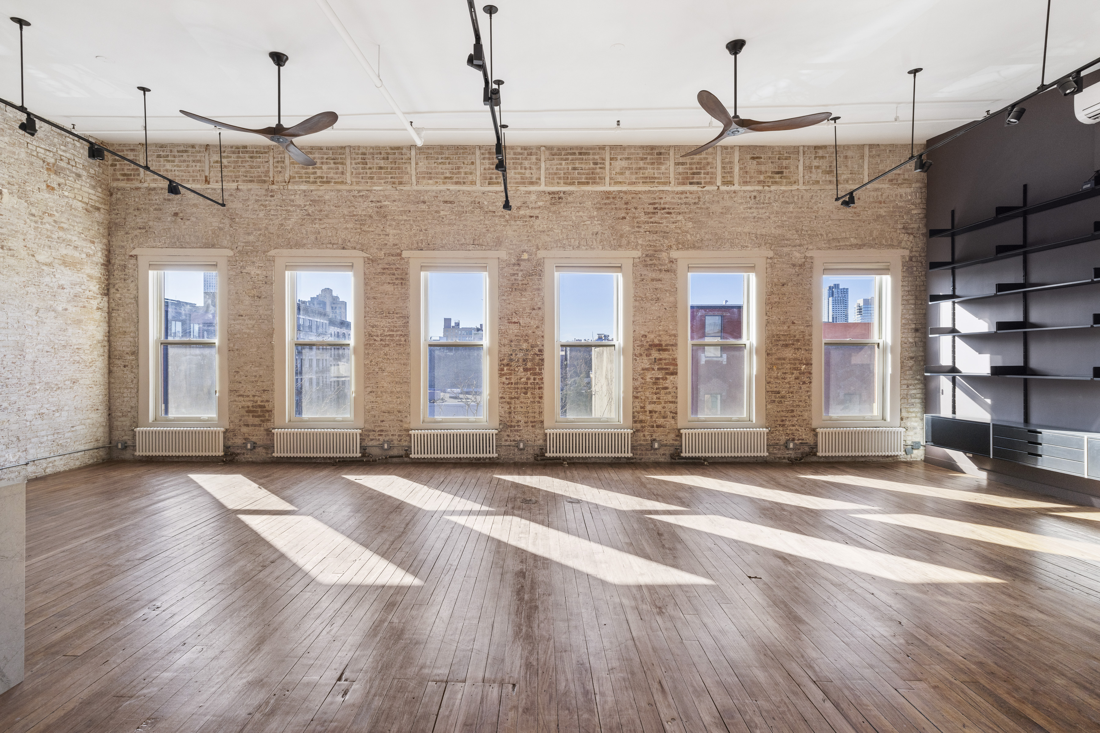 a view of a building with a street