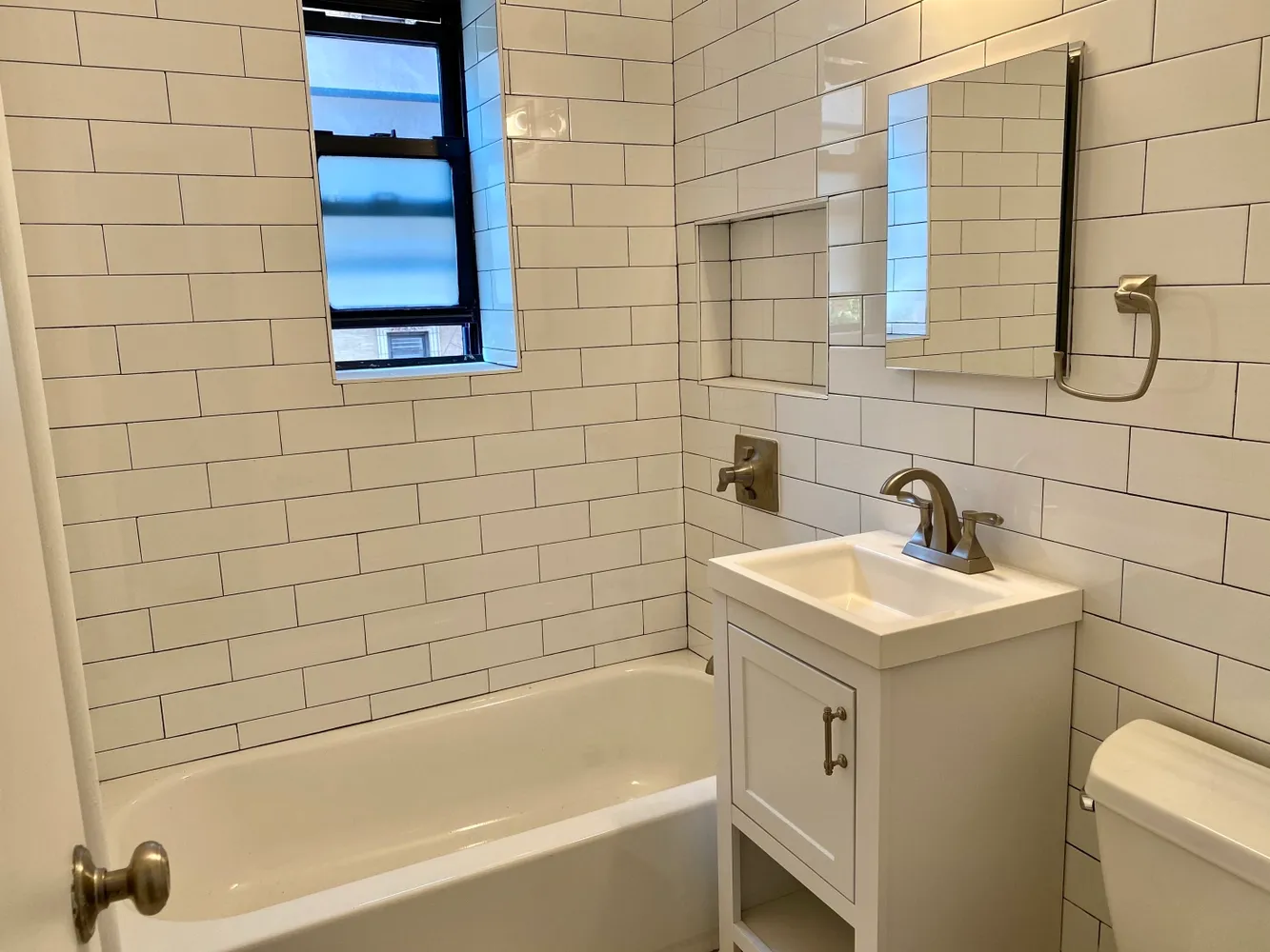 a bathroom with a sink and a bathtub