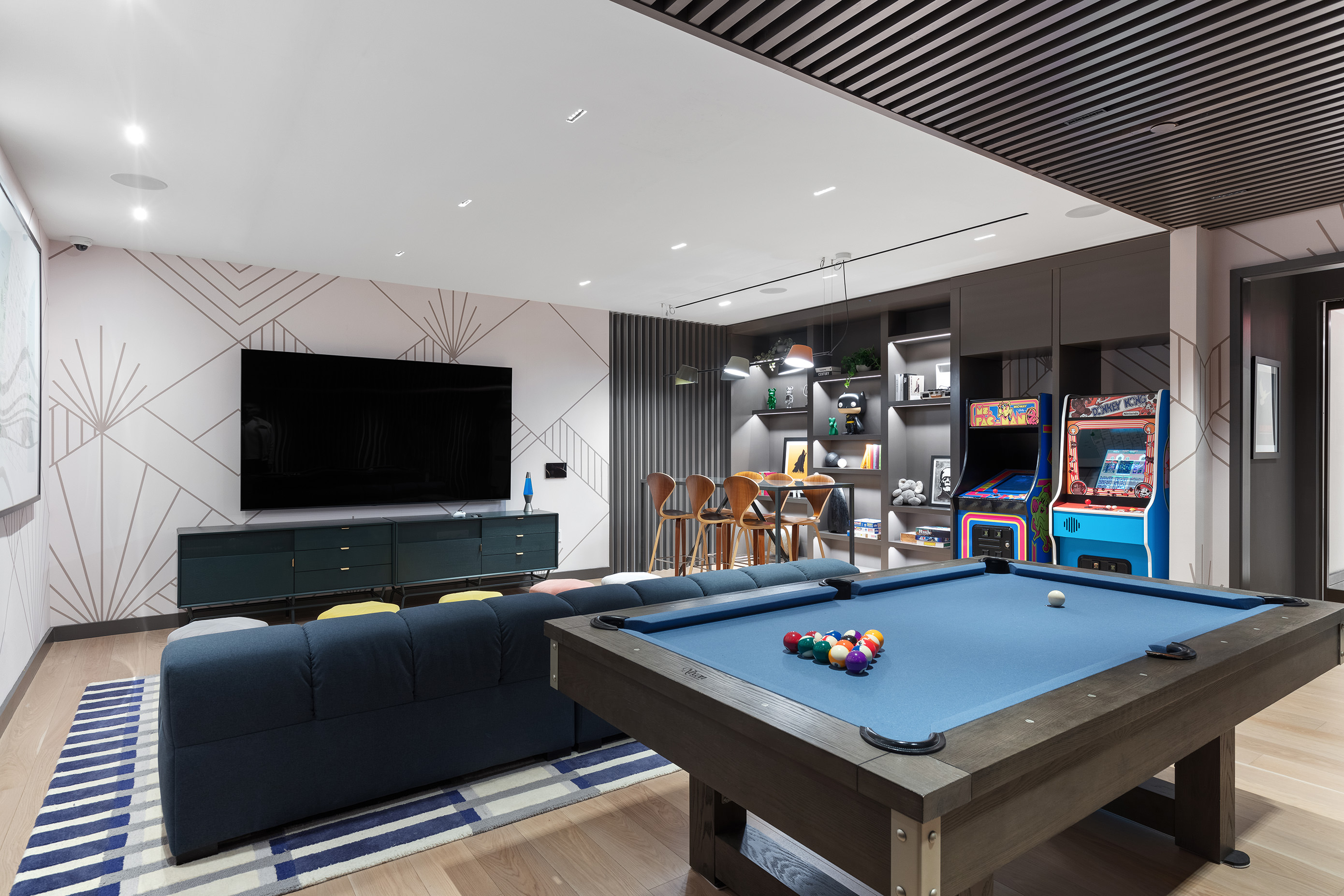 310 East 86th Street, Unit 4B Manhattan, NY 10028 - Photo 21 of 25 a living room with furniture and a flat screen tv