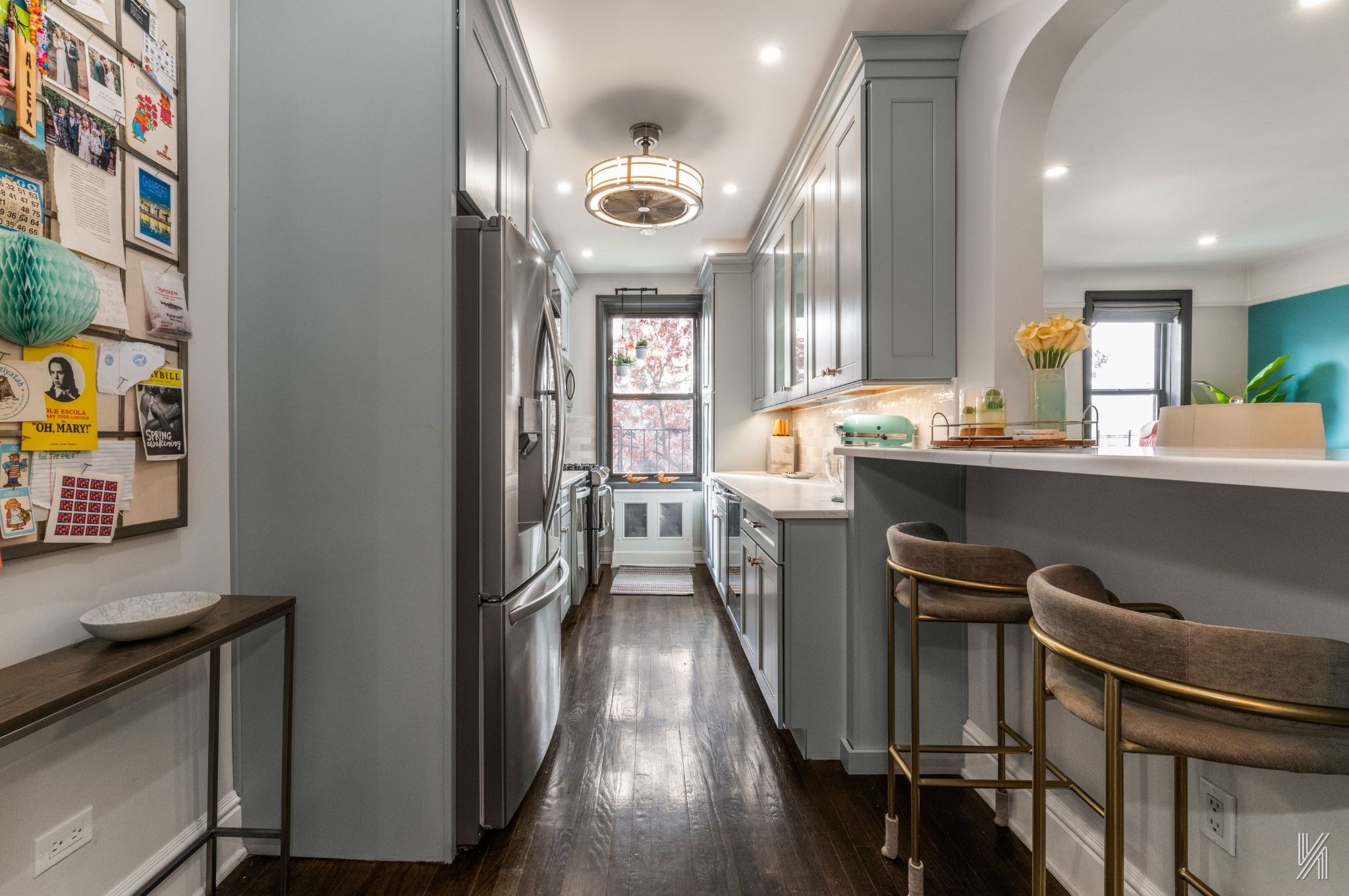 35-06 88th Street, Unit 3G Queens, NY 11372 - Photo 7 of 20 a view of a dining room with furniture and a chandelier