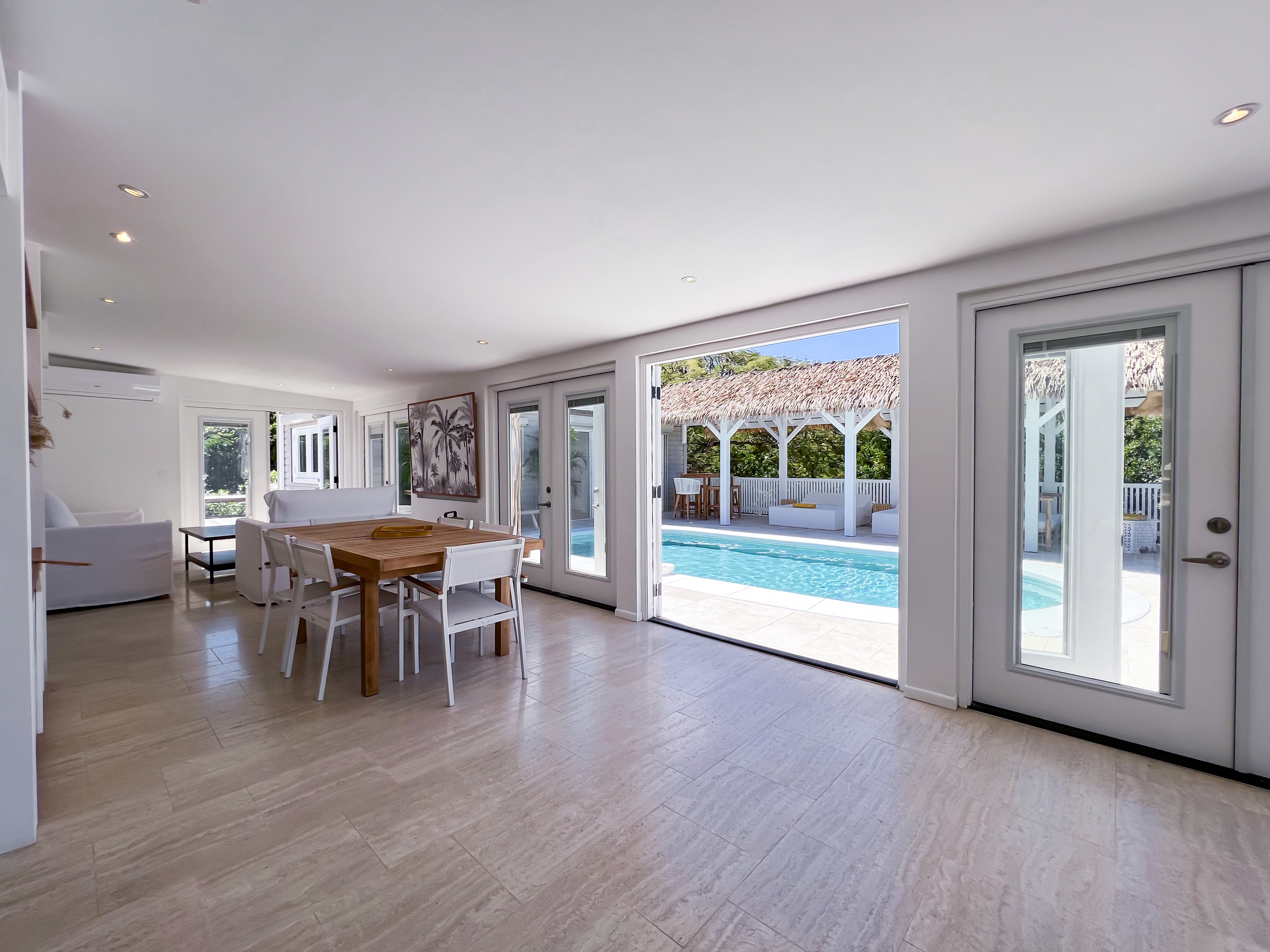Terres Basses St. Martin, undefined 97150 - Photo 12 of 32 a view of a dining room with furniture and wooden floor