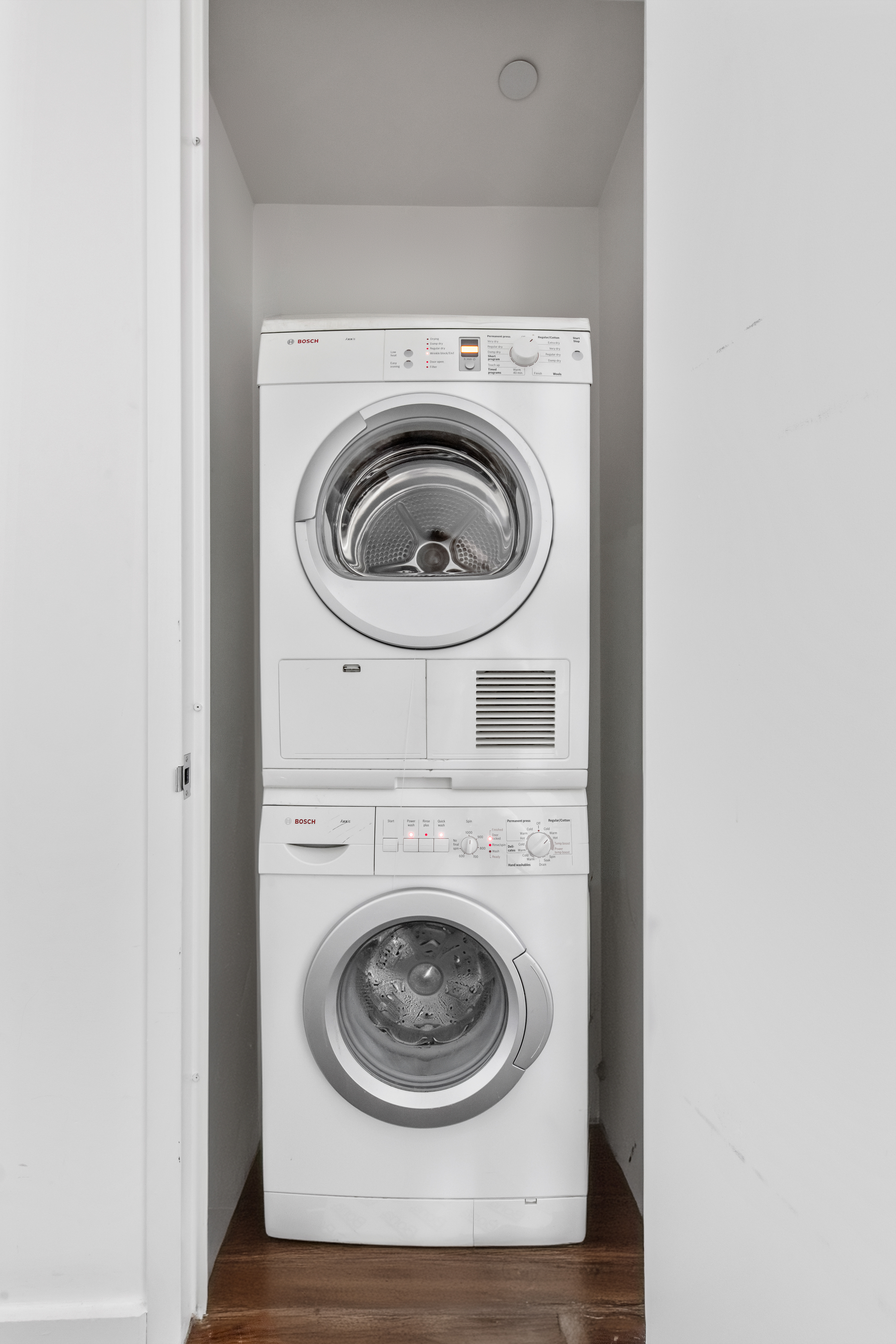 340 East 23rd Street, Unit 4D Manhattan, NY 10010 - Photo 10 of 19 a utility room with dryer and washer