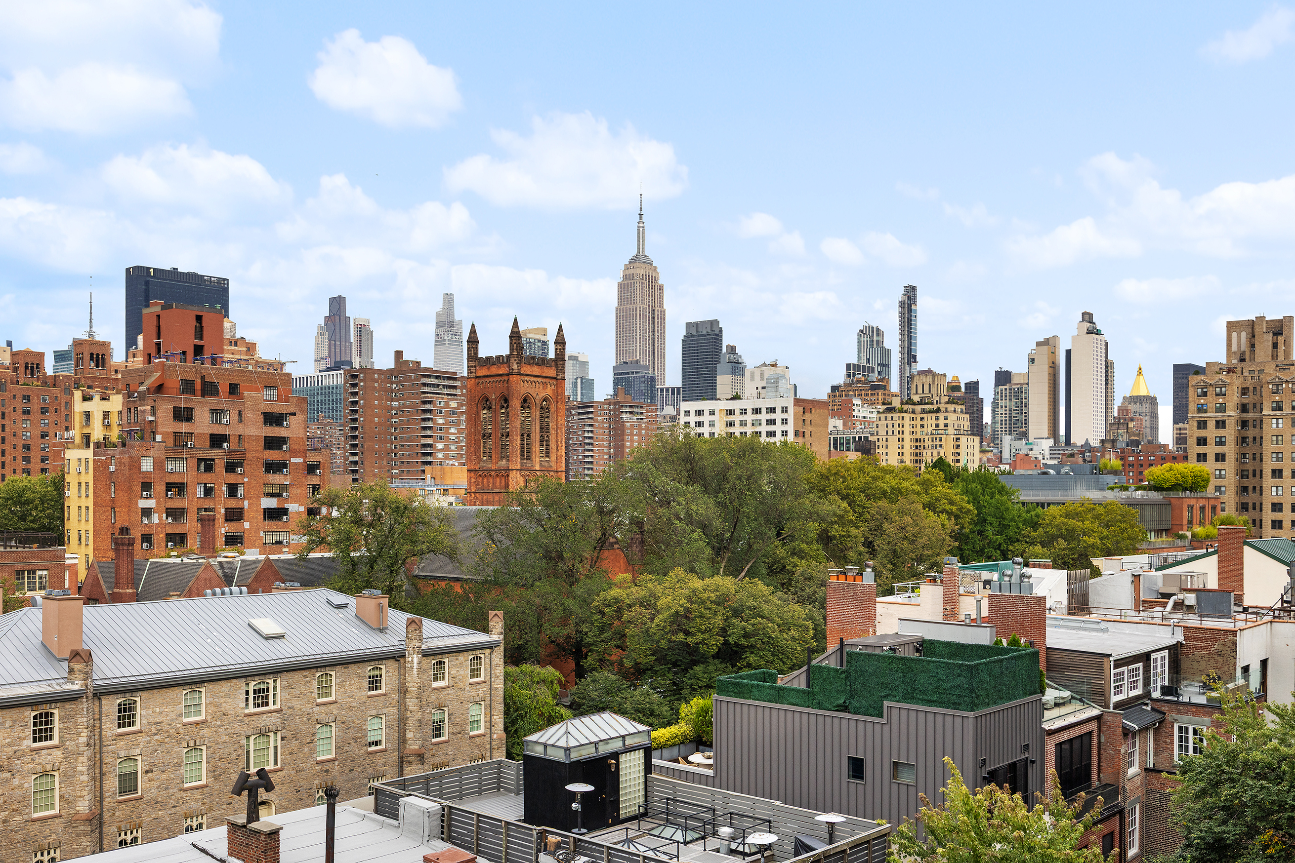 455 West 19th Street, Unit PH2 Manhattan, NY 10011 - Photo 24 of 26 a view of a city with tall buildings